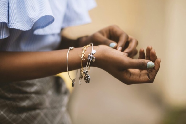 Bracelets being tried on at a jewelry counter